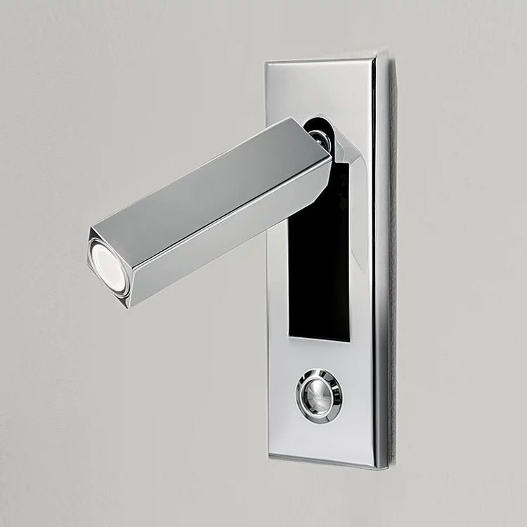 Detail of the compact head on a recessed bedside wall sconce