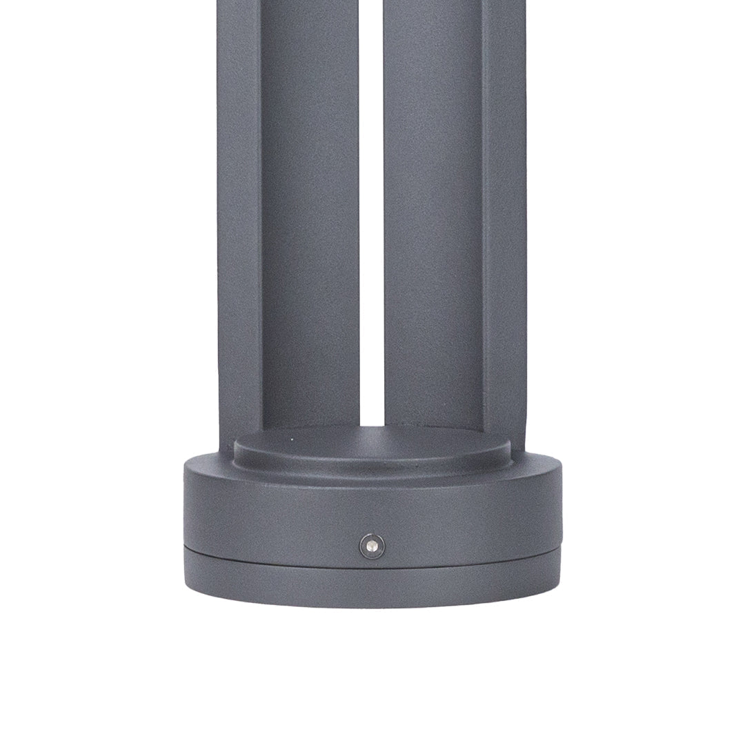 Close view of the bollard's round base ring and the small fixing screw on its side.