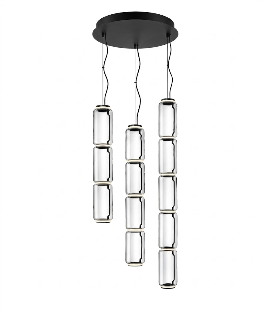 Studio shot of this Clérachic pendant's three-stem fixture, each strand holding a stack of small glass cylinders.