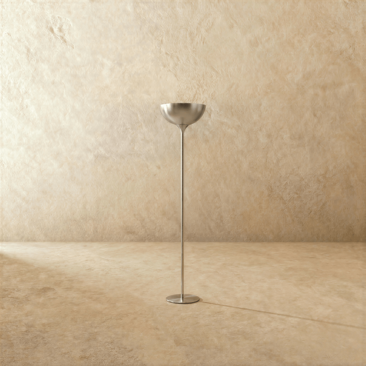 Clérachic floor lamp in chrome, the bowl shade and slim stem shown from a slightly different angle.
