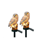 Solar owl garden pathway light on its ground stake, shown on a white background