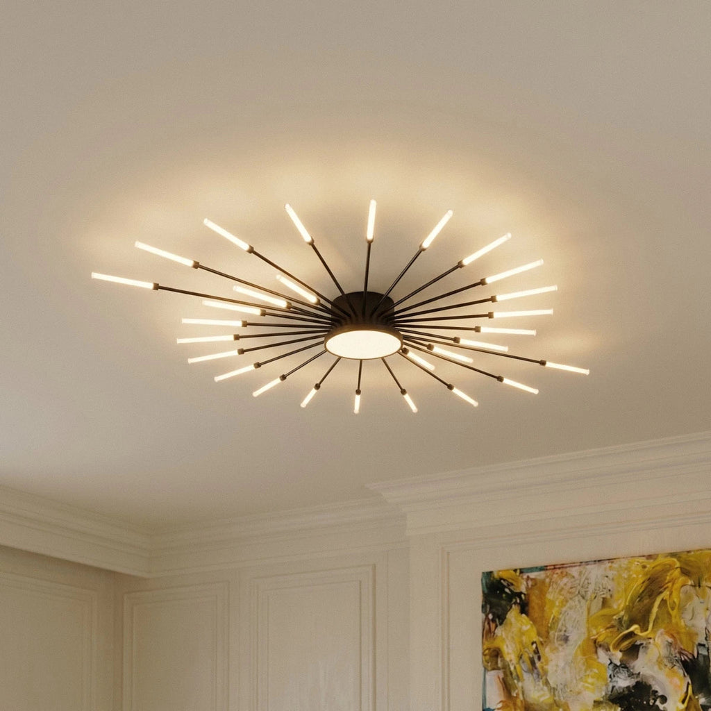 Clérachic starburst chandelier in black, seen from below at a corniced ceiling, the frosted disc glowing beneath its drum.
