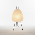 Minimalist tripod rice paper table lamp shown lit from the front