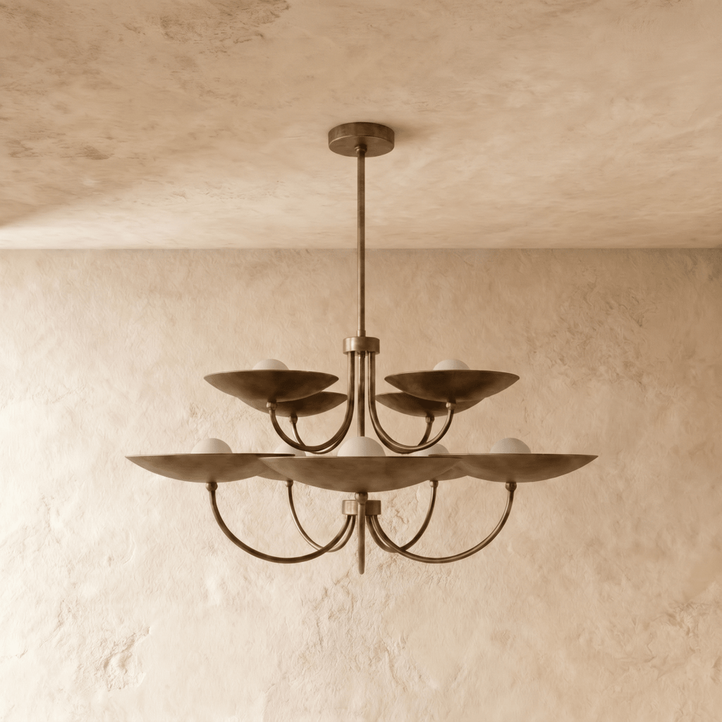 Clérachic two-tier disc chandelier in vintage brass, shown from a slightly closer studio angle overhead.