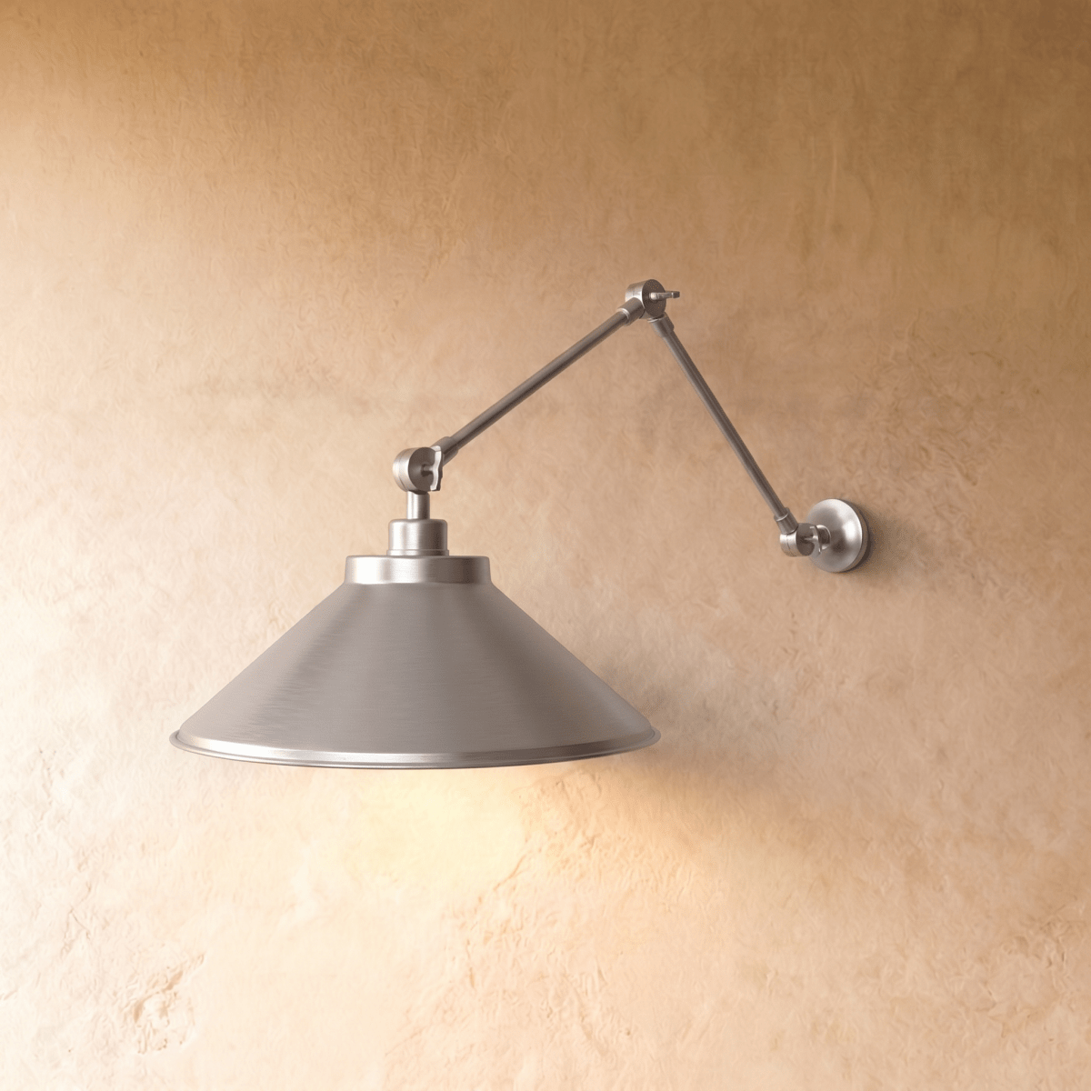 Clérachic wall lamp in chrome, its wide cone shade extending from a double-jointed swing arm.