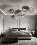 Wabi-sabi organic chandelier combination over an open-plan space