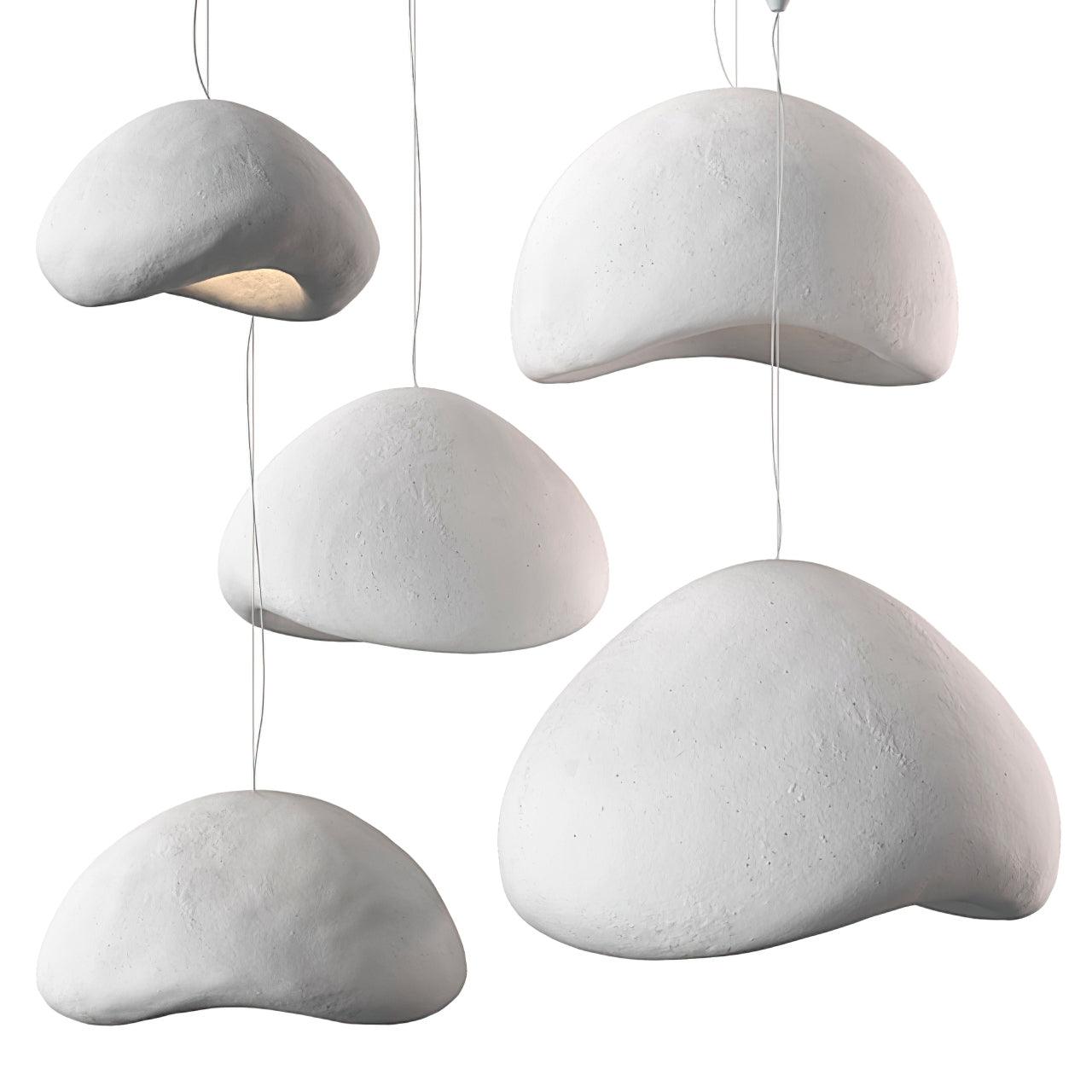 Wabi-sabi organic chandelier with organic shades over a space