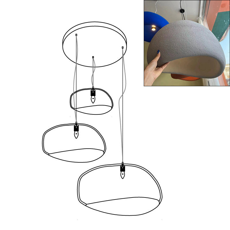 Wabi-sabi organic chandelier with sculptural HDPE shades