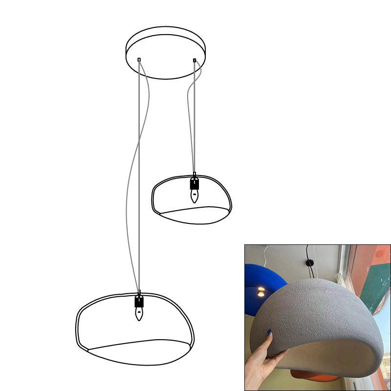 Wabi-sabi organic chandelier combination shown lit warmly