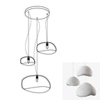 Wabi-sabi organic chandelier with organic forms casting shadows