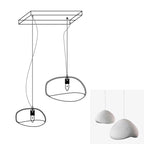 Wabi-sabi organic chandelier shown in a large open interior
