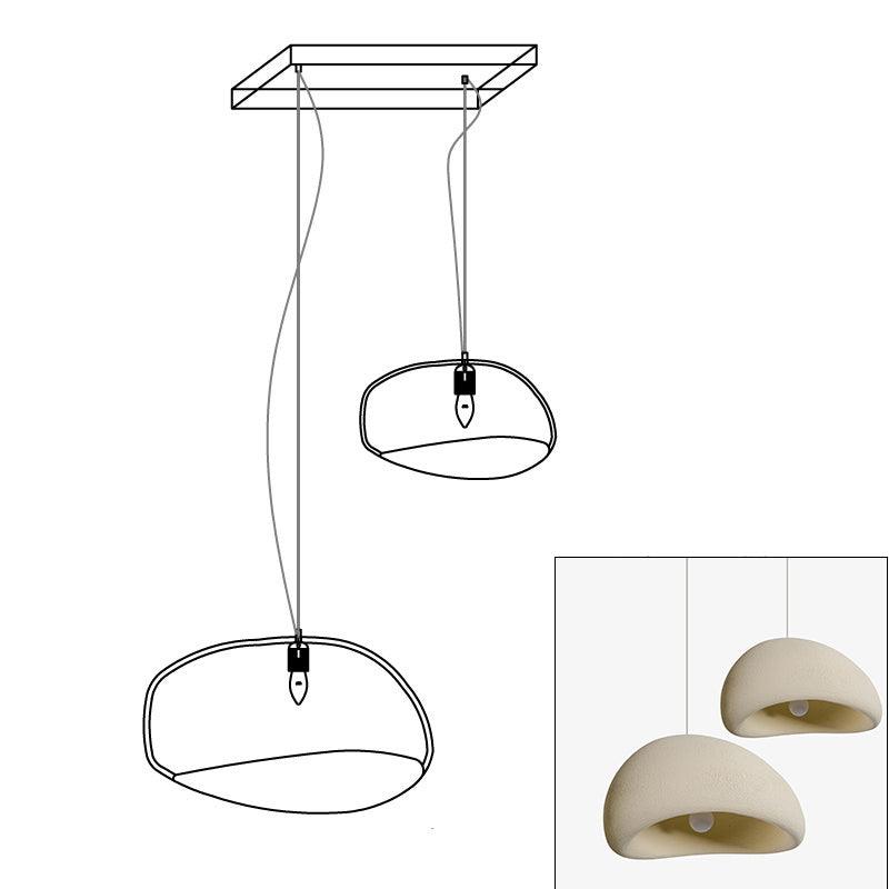 Wabi-sabi organic chandelier with neutral shades in a calm room