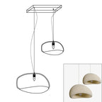 Wabi-sabi organic chandelier with neutral shades in a calm room