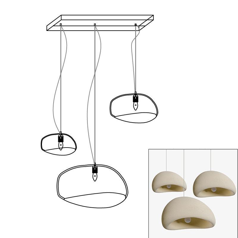 Wabi-sabi organic chandelier over a large meditative space
