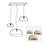 Wabi-sabi organic chandelier over a large meditative space