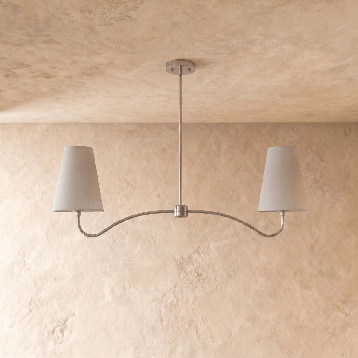 Clérachic double-arm chandelier in chrome, the curved arms and cone shades viewed from another angle.