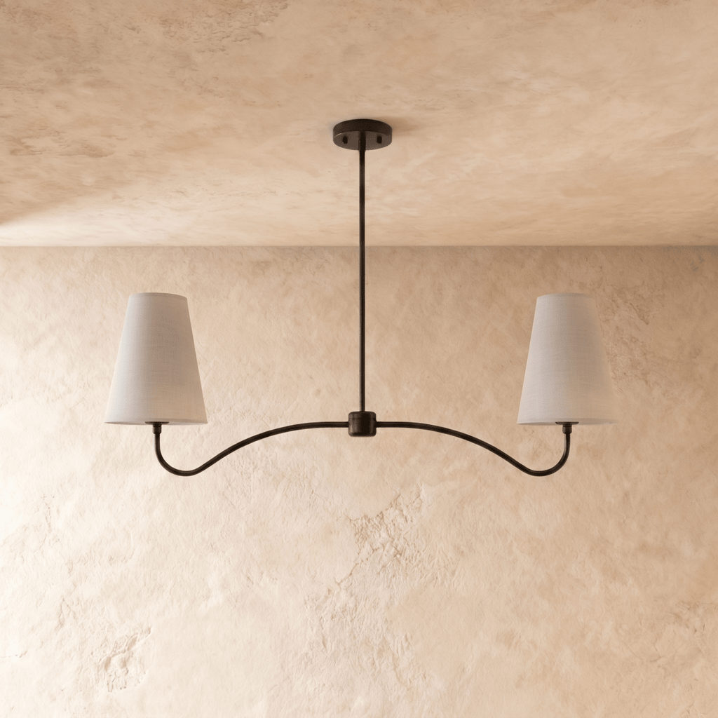 Clérachic double-arm chandelier in matte black, the curved arms and cone shades viewed from another angle.