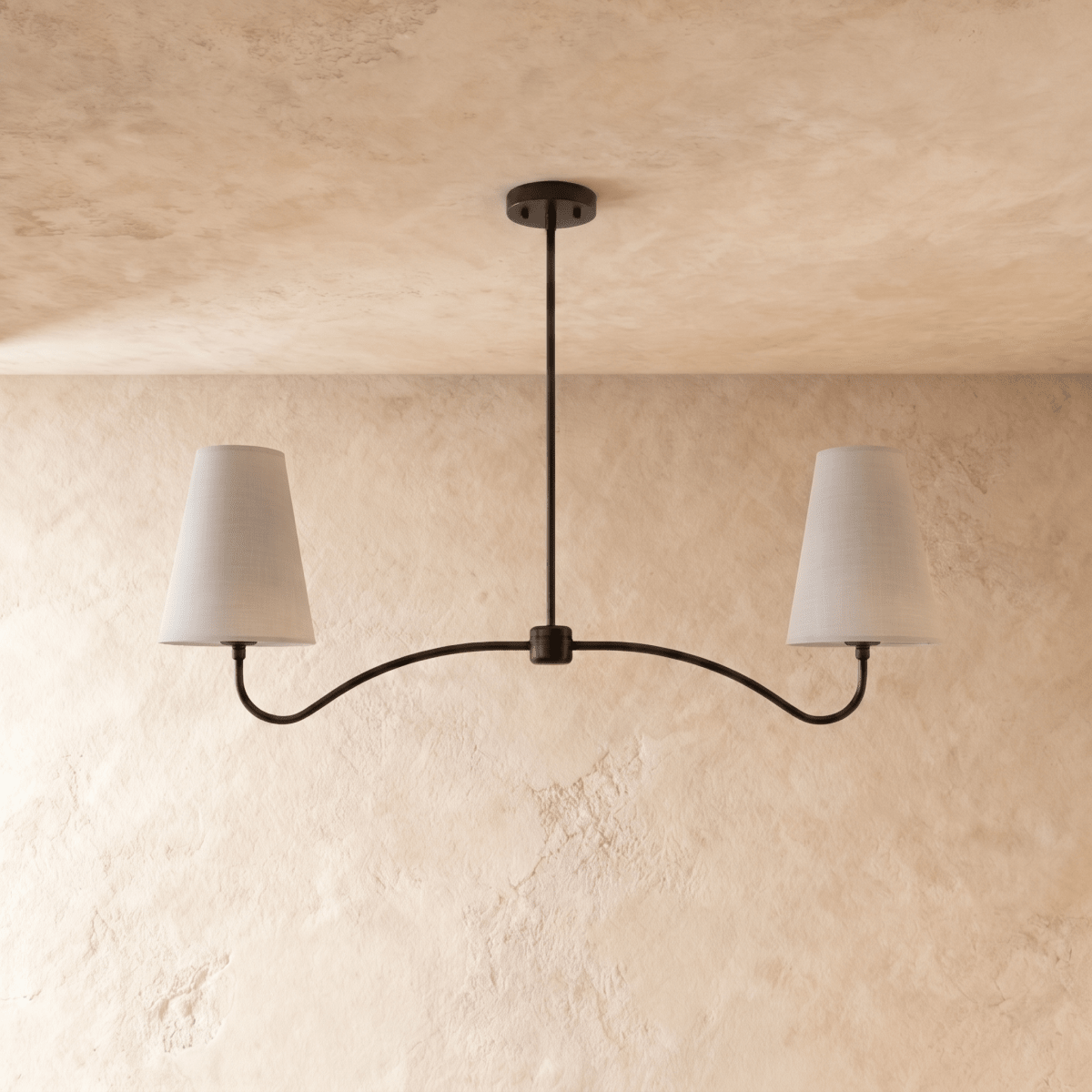 Clérachic double-arm chandelier in matte black, the curved arms and cone shades viewed from another angle.