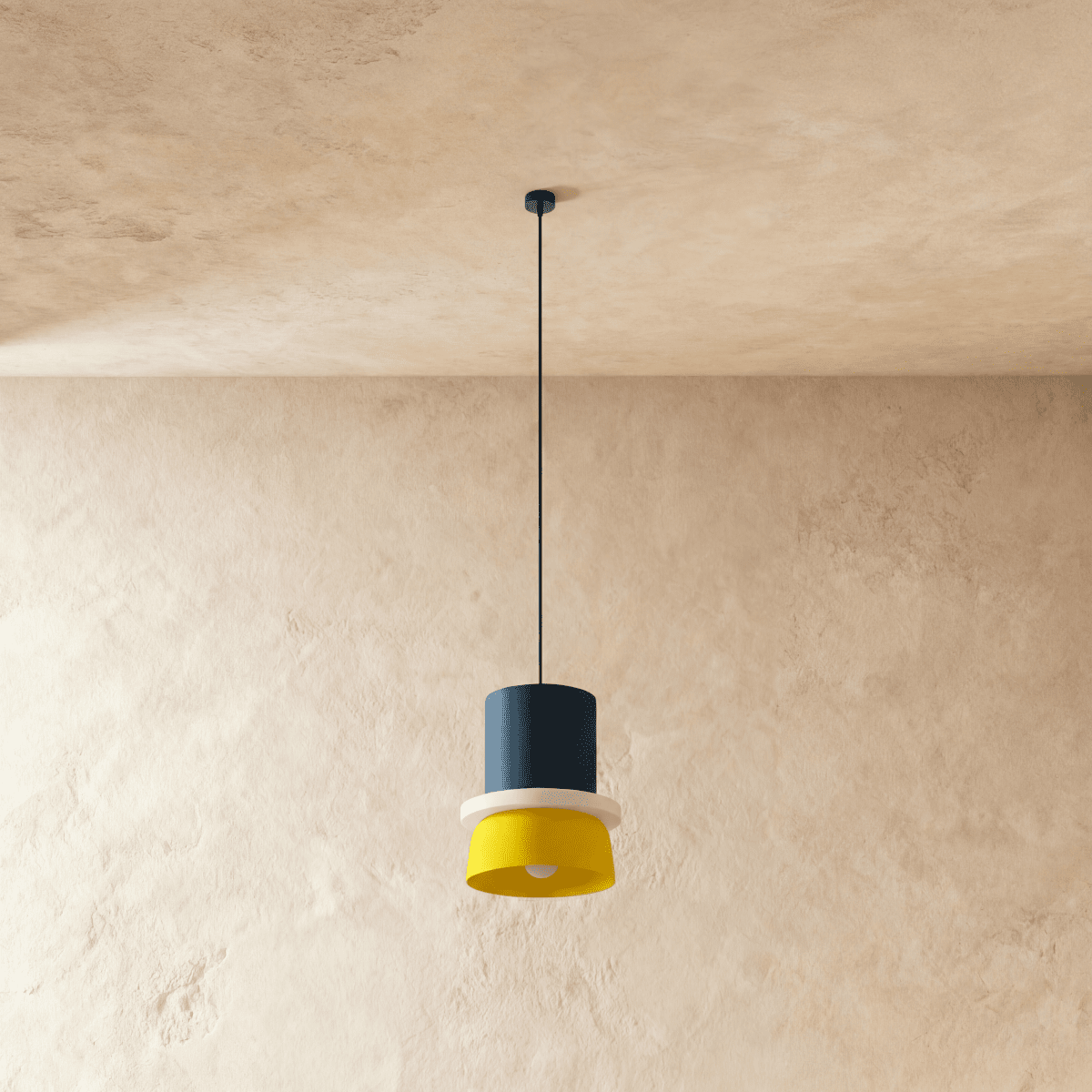 Clérachic pendant light in navy over yellow, unlit, so the cylinder-over-bowl outline reads clearly.