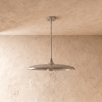 Clérachic pendant light in chrome, the saucer shade and slender rod shown from a slightly different angle.