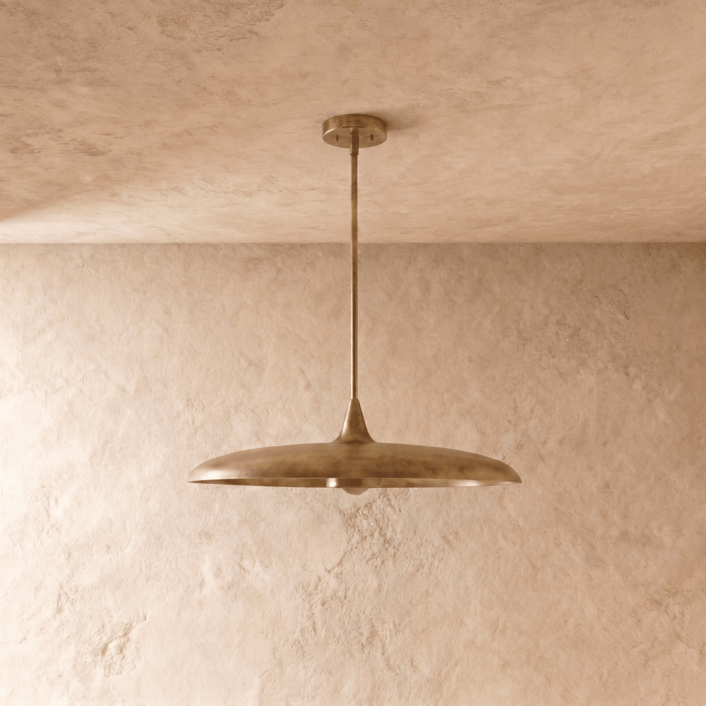 Clérachic pendant light in vintage brass, the saucer-shaped shade and rod viewed from a slightly different angle.