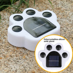 Close view of the light on stone with an inset callout naming the polycrystalline silicon solar panel.