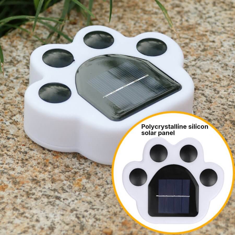 Close view of the light on stone with an inset callout naming the polycrystalline silicon solar panel.