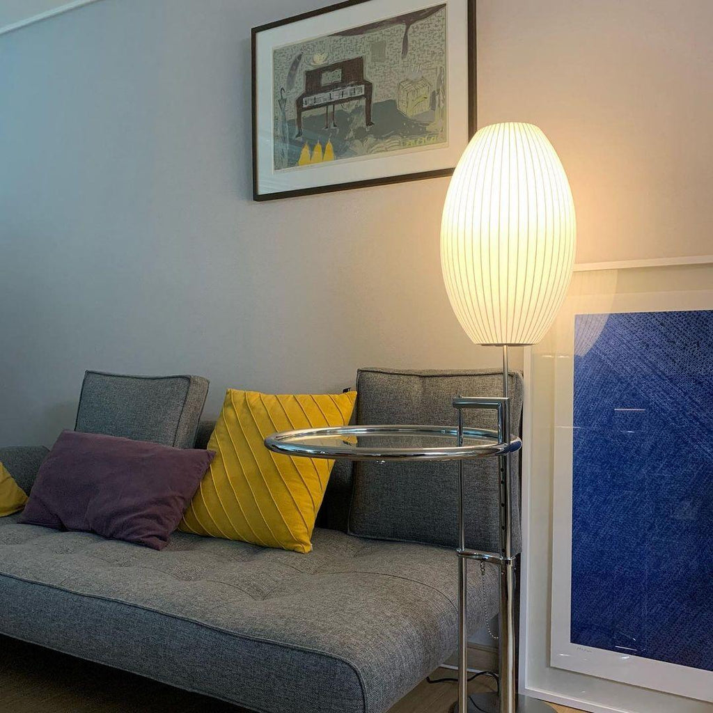 Side profile of the faux silk bubble table lamp and round chrome base