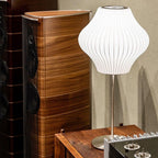 Faux silk bubble table lamp styled beside a sofa for warm ambient light