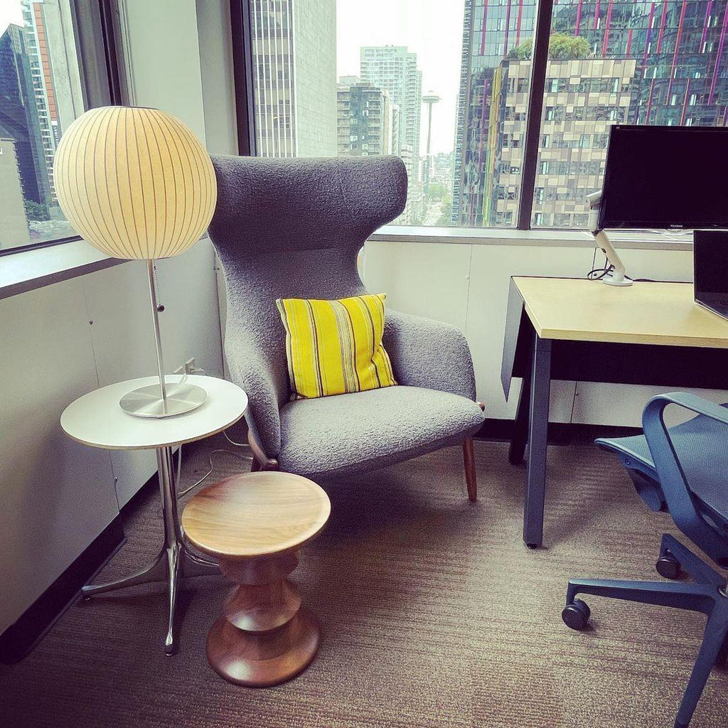 Side profile of the faux silk bubble table lamp and round chrome base