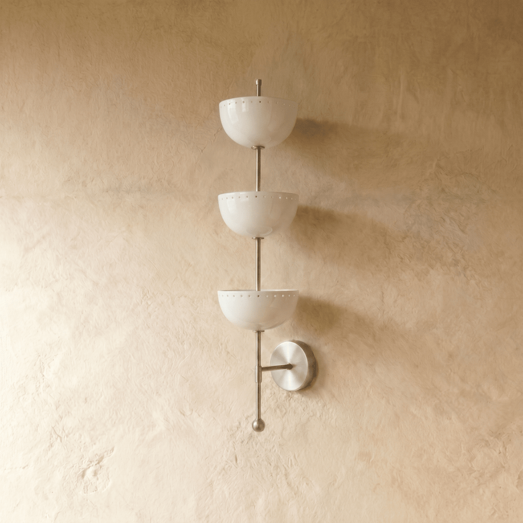 Clérachic three-tier bowl sconce in chrome, shown from a slightly closer studio angle on a plaster wall.