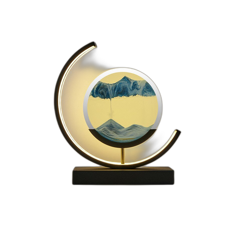 Moving sand art LED table lamp with blue sand and a warm glowing ring on a black base
