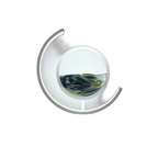 Moving sand art lamp with olive-green sand settling into rolling dunes inside the glass disc