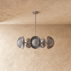 Clérachic chandelier in chrome, the disc shades and glass globes viewed from a slightly different angle.