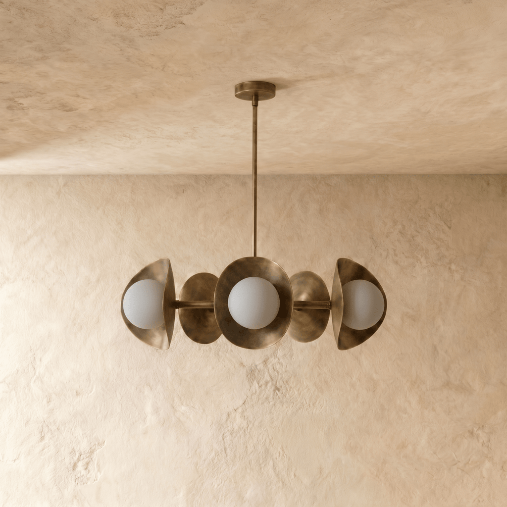 Clérachic chandelier in vintage brass, the disc shades and glass globes viewed from a slightly different angle.