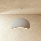Clérachic Shibui pendant light in the Cloud form, a greyer, deeper white shade with matte grain and no surface shine.