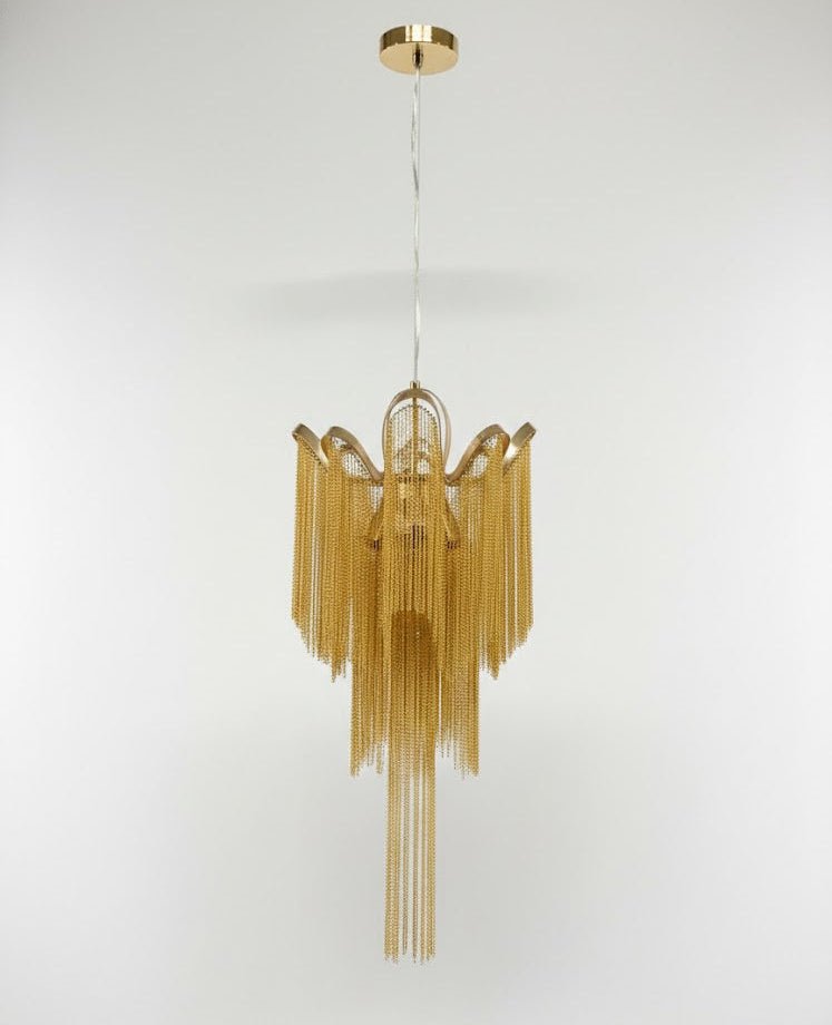 Its ceiling mount plate is visible above this lit gold Clérachic chandelier, shown against a white backdrop.