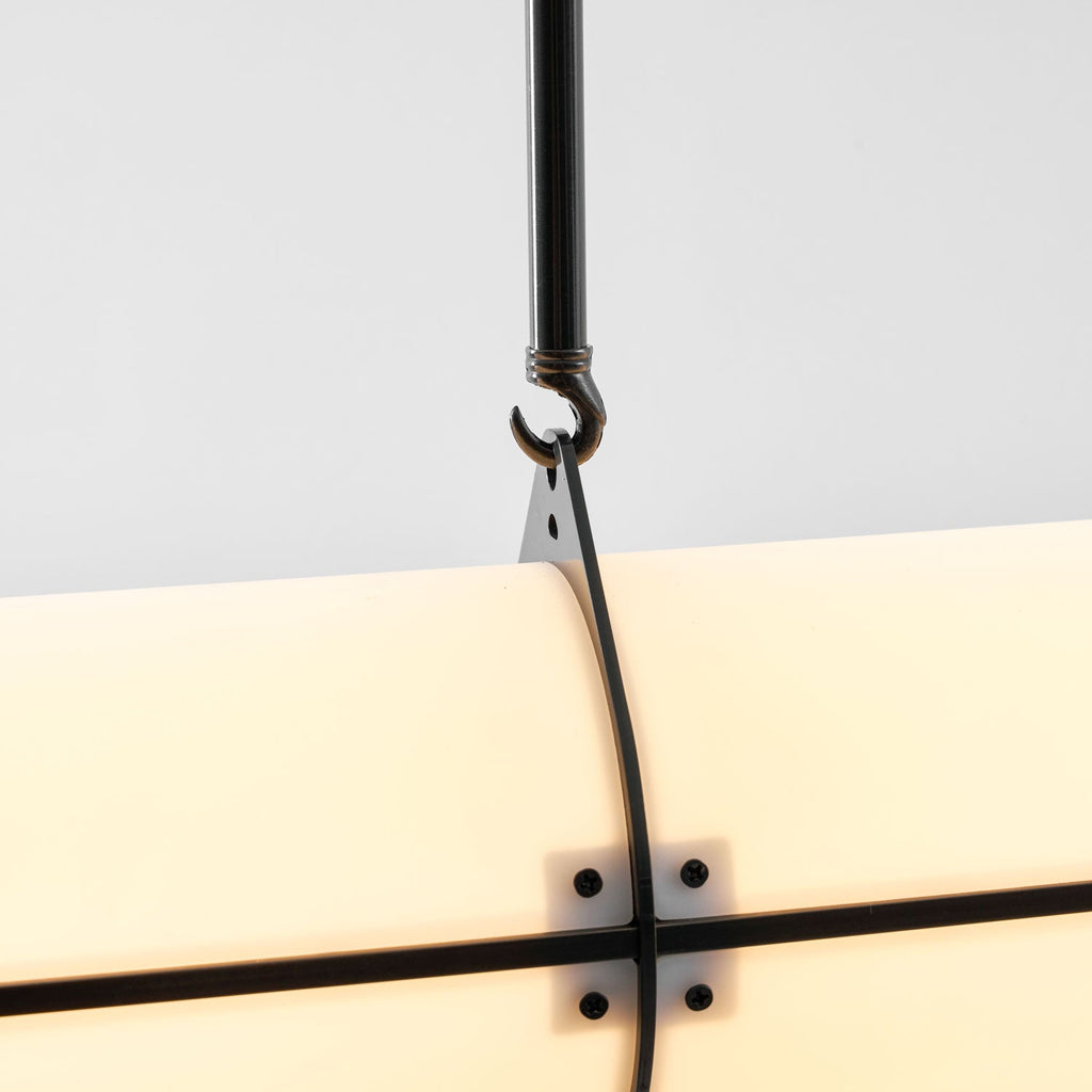 Linear pendant light detail of the end cap and rod