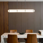 Linear pendant light shown lit against a plain background