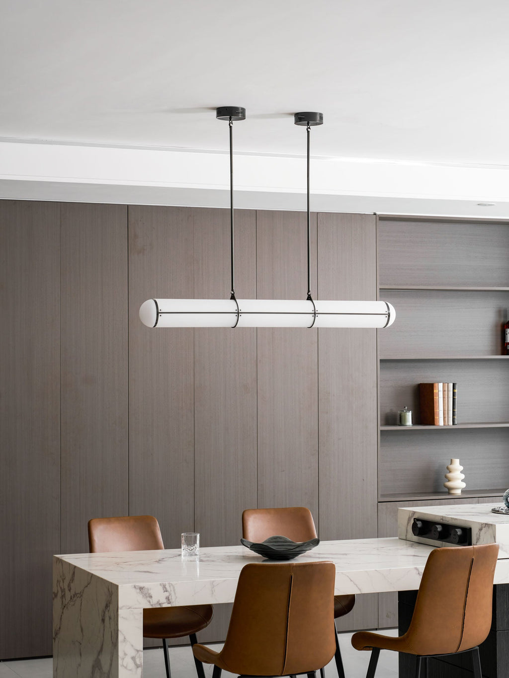 Linear pendant light suspended in a contemporary space