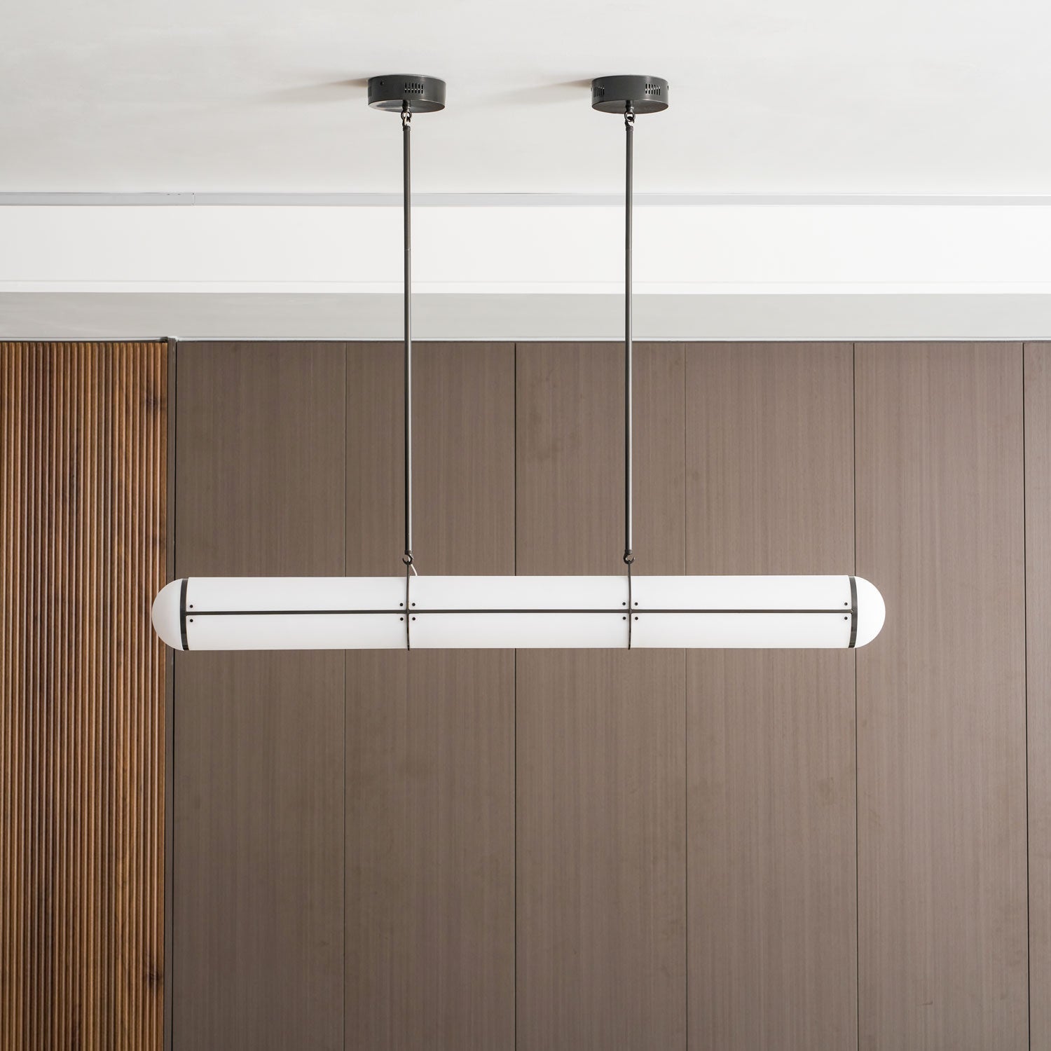 Linear pendant light close-up of the bar and finish