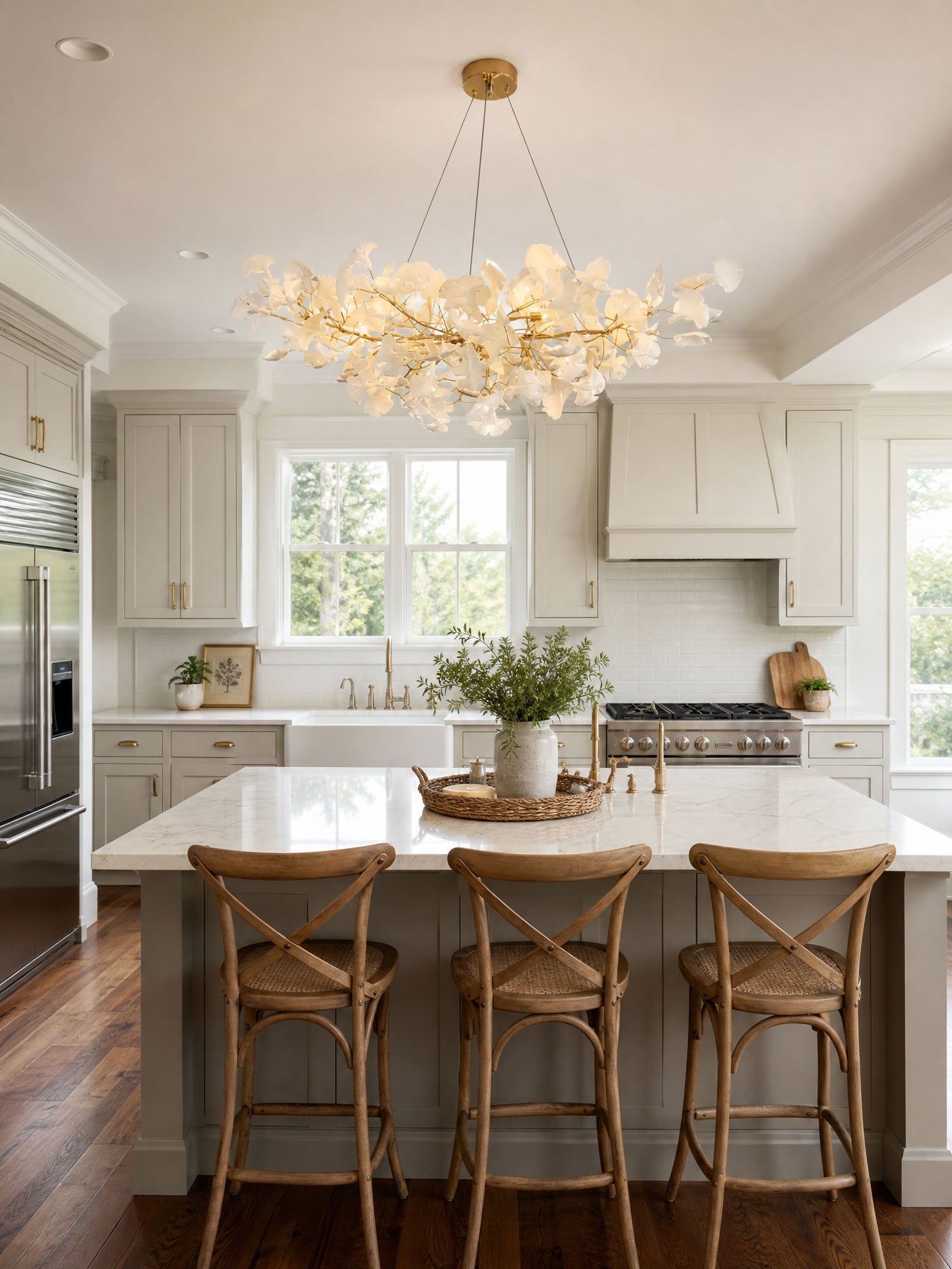 Gingko leaf chandelier hanging in a bright contemporary room