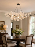 Gingko leaf chandelier as a statement light in a modern hallway