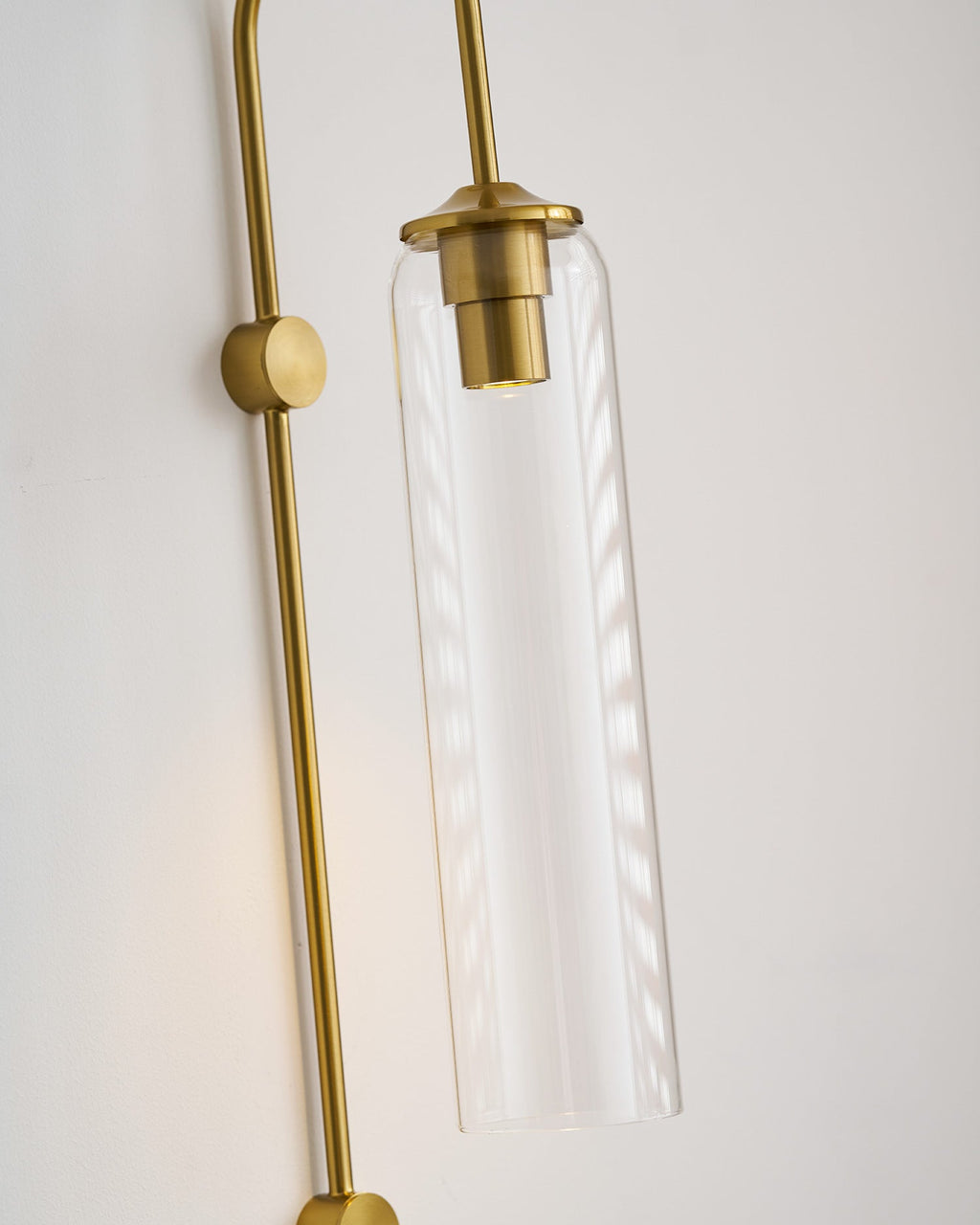 glass wall lamp room view of the lit glass cylinder