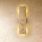 Clérachic travertine wall light, slim stone bar washing light up and down a limewash wall