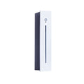 Matte white stair light seen from an angle, unlit, with the recessed housing visible behind the faceplate.
