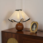 Wavecrest table lamp styled on a bedside table