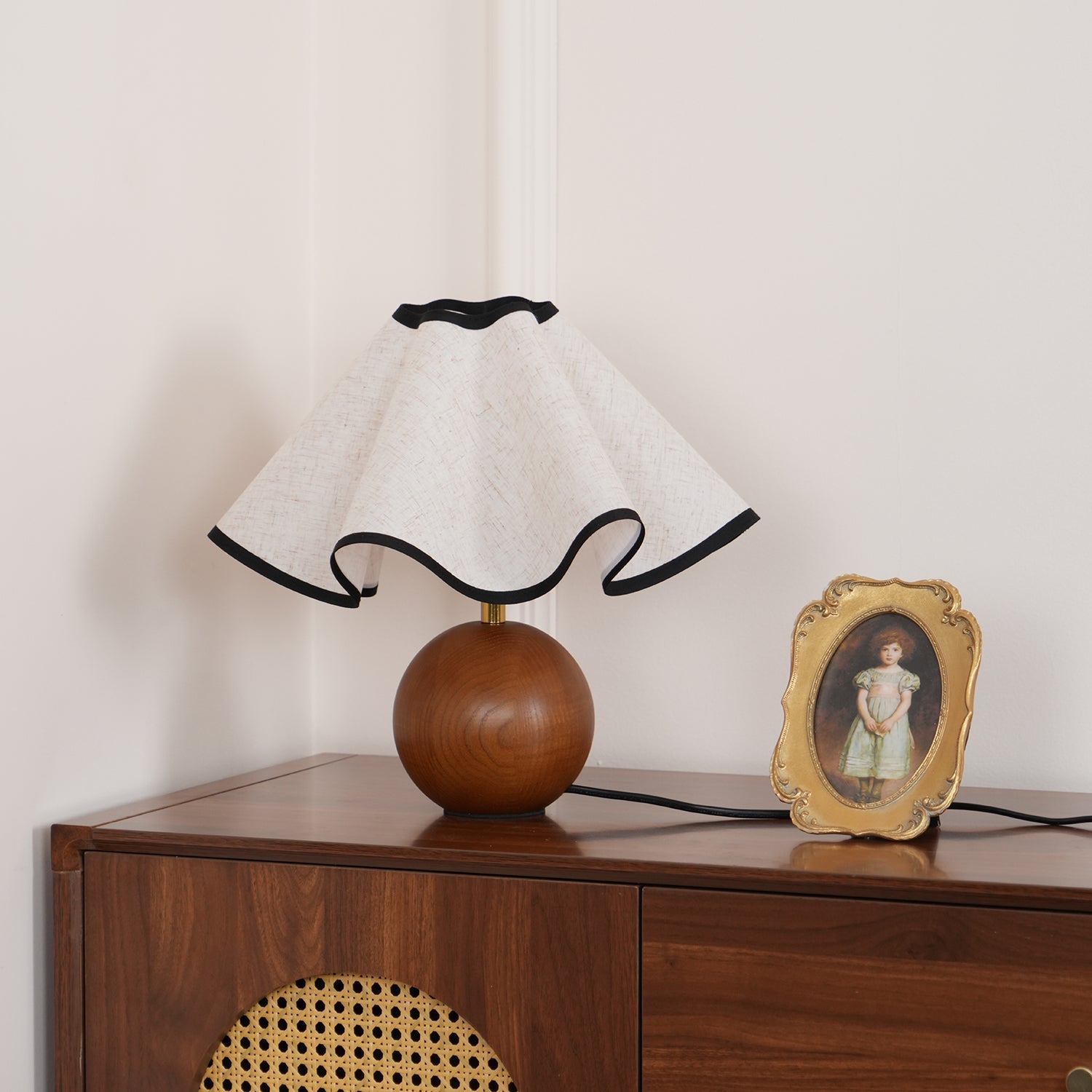 Wavecrest table lamp glowing in an evening interior setting